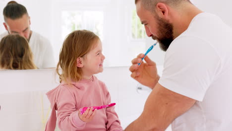 Father,-learning-and-teaching-girl-to-brush-teeth