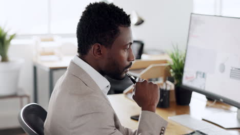 Black-man,-business-and-thinking-at-computer