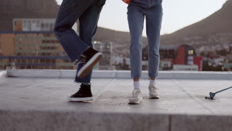 Friends,-rooftop-and-dancing-city-couple-with-view