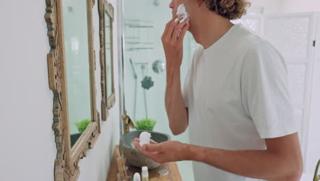 Man,-shaving-foam-and-cleaning-face-in-bathroom