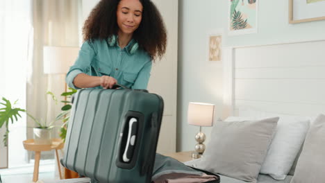 Travel,-vacation-and-black-woman-packing-suitcase