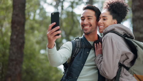 Hiking,-selfie-and-young-couple-in-forest-smiling