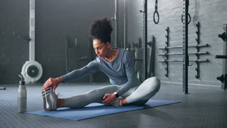 Black-woman,-gym-and-stretching