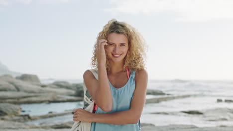 Woman,-beach-and-travel-with-smile-in-portrait