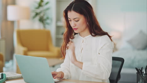 Stress,-burnout-and-neck-pain-with-woman-at-laptop