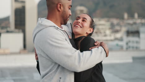 Happy,-black-couple-and-rooftop-for-hug