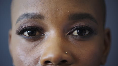 Closeup,-eyes-and-black-woman-with-makeup