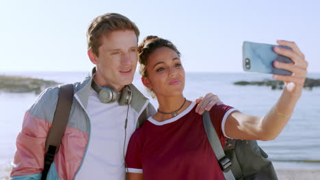 Interracial,-selfie-and-couple-with-smartphone