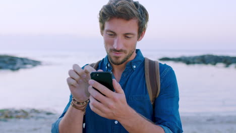 Beach,-man-and-phone-with-app-for-travel-journey
