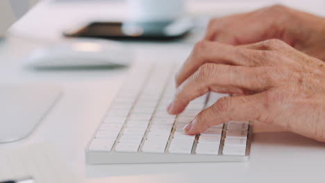 Hands,-phone-and-typing-on-keyboard-in-office