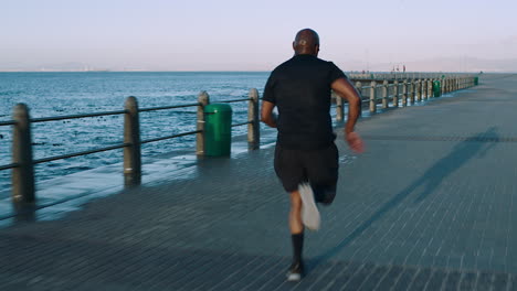 Black-man,-runner-by-the-beach
