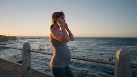 Fitness,-pregnant-woman-and-relax-by-the-beach