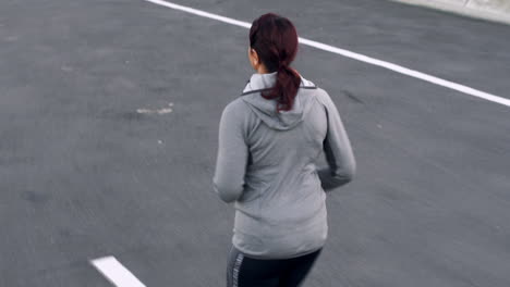 Woman,-fitness-or-city-running-on-road