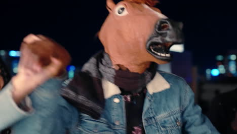 Party,-dance-and-man-in-horse-mask