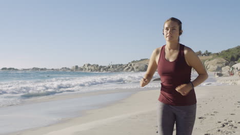 Running-on-beach,-fitness-and-woman