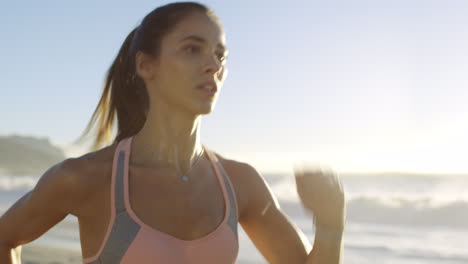 Fitness,-beach-and-woman-running-for-cardio