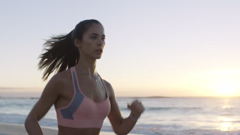 Running,-fitness-and-woman-on-beach-for-run