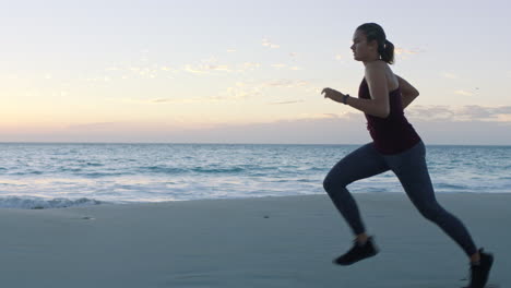 Running,-runner-and-woman-on-beach-for-fitness