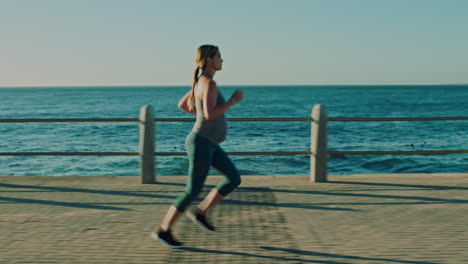 Pregnancy-wellness,-running-on-beach
