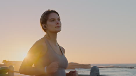 Beach,-earphones-and-woman-running-at-sunset