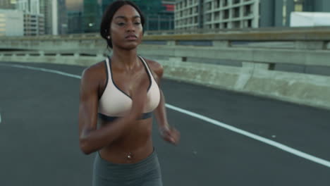 Runner,-fitness-or-black-woman-running-on-road