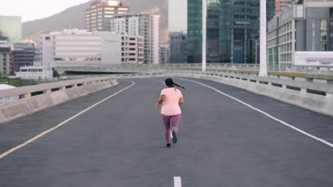 Plus-size-fitness,-woman-or-running-on-city-road