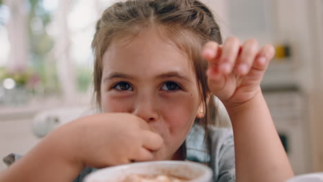 Young-child,-face-and-happy-eating-breakfast