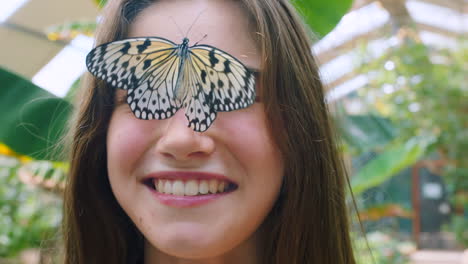 Nature,-animals-and-girl-with-butterfly-on-face