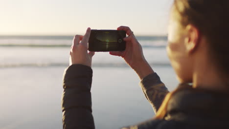 Phone,-beach-and-travel-with-a-woman-tourist