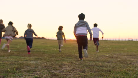 Children-group,-running-and-field-for-play-race