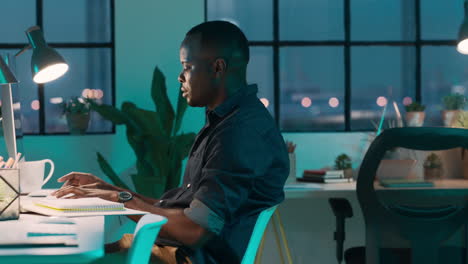 Black-man,-computer-and-work-in-night-at-startup