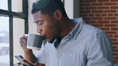 Coffee,-window-and-man-with-phone-reading-digital