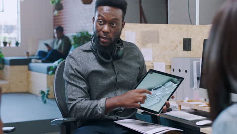 Black-man,-digital-tablet-and-meeting