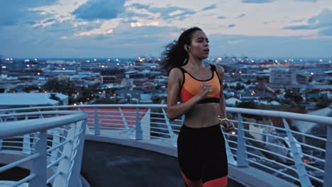 Runner,-black-woman-and-bridge-in-city-with-music