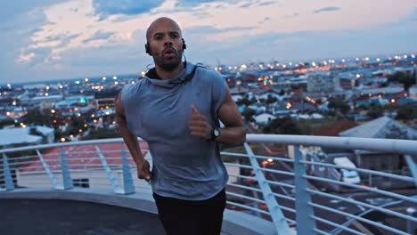 Black-man,-runner-and-athlete-rest-on-bridge