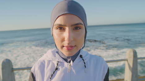 Fitness,-exercise-and-face-of-Muslim-woman-by