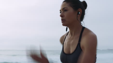 Woman,-music-earphones-or-running-by-beach