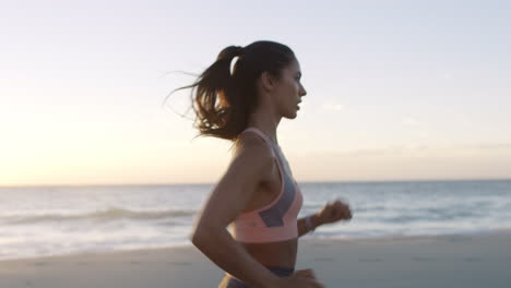 Fitness,-running-and-woman-on-beach-with-energy