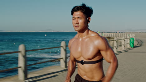 Running,-fitness-and-Asian-man-with-music