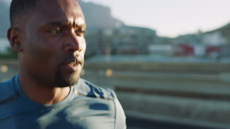 Fitness,-workout-and-black-man-running-in-the-city