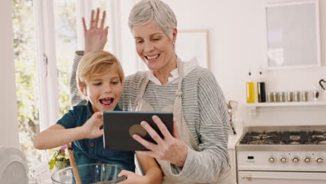 Grandmother,-boy-and-video-call-on-tablet