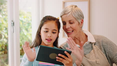 Video-call,-grandmother-and-girl-with-tablet