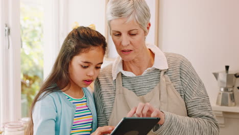 Tablet-learning,-online-and-girl-with-grandmother