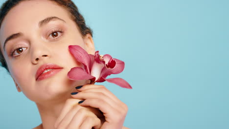Beauty,-skincare-or-face-of-woman-with-flower
