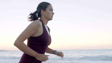 Fitness,-running-and-woman-athlete-by-the-sea