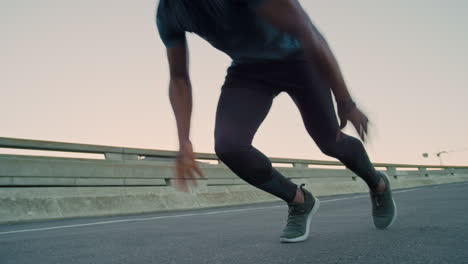 Fitness,-sprint-and-black-man-running-in-the-road