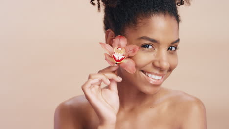 Face,-flower-and-black-woman-with-cosmetics