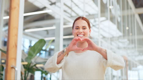 Woman-in-office-walking-with-heart-sign