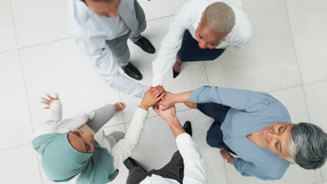 Hands-together,-business-people-and-teamwork