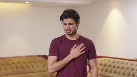 Young-Indian-man-feeling-discomfort-in-his-chest